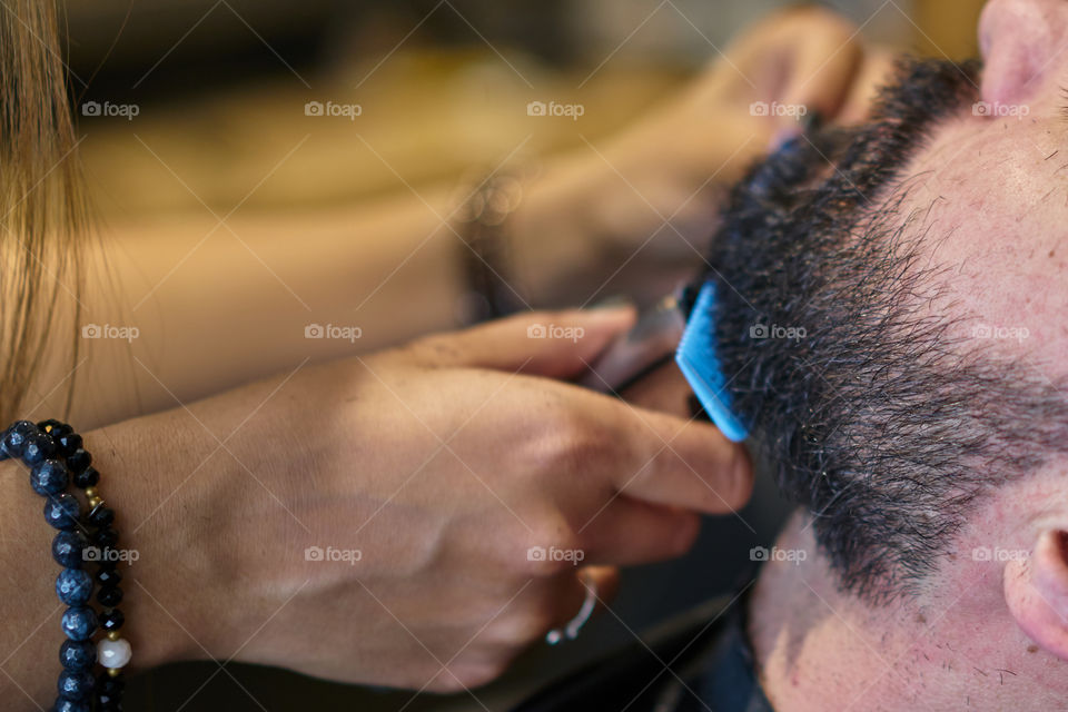 Young man at the barber