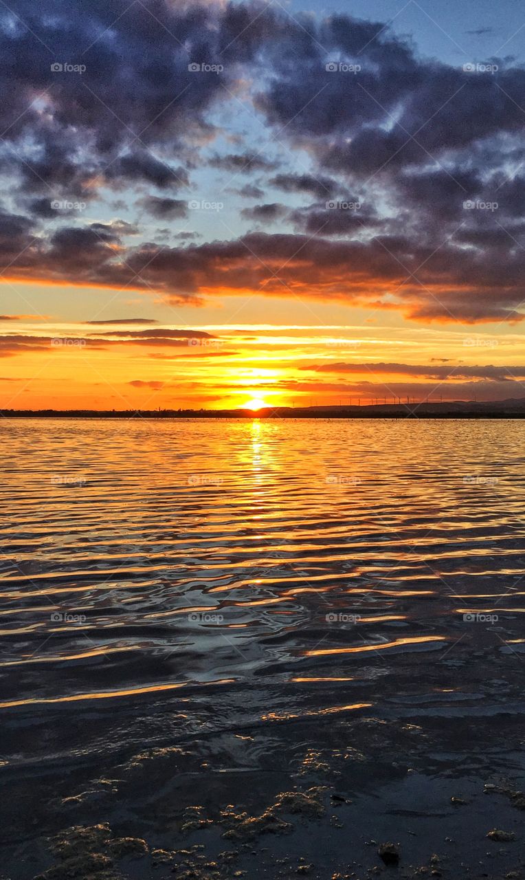 Sunset by the salt lake in Larnaca, Cyprus. Usually, the salt lake dries up in the summer and fills up with water when the rain comes. And in the winter, it attracts thousands of flamingos! A great place to visit.