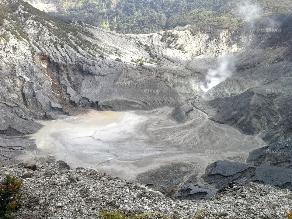 The crater of an active volcano