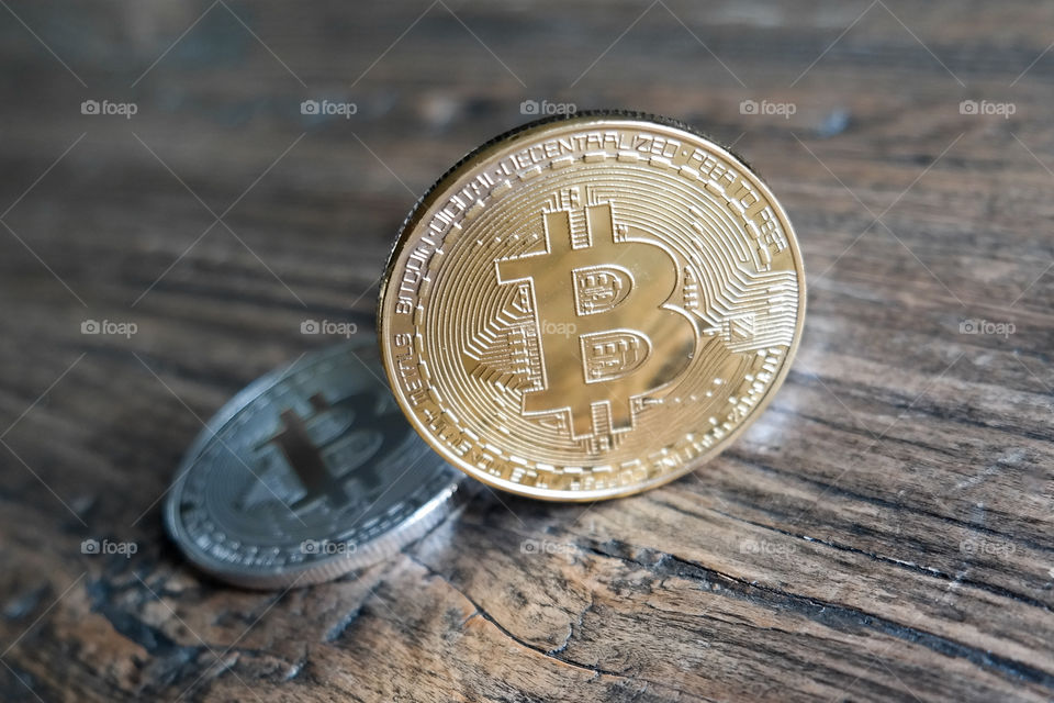 Golden and silver bitcoin coins