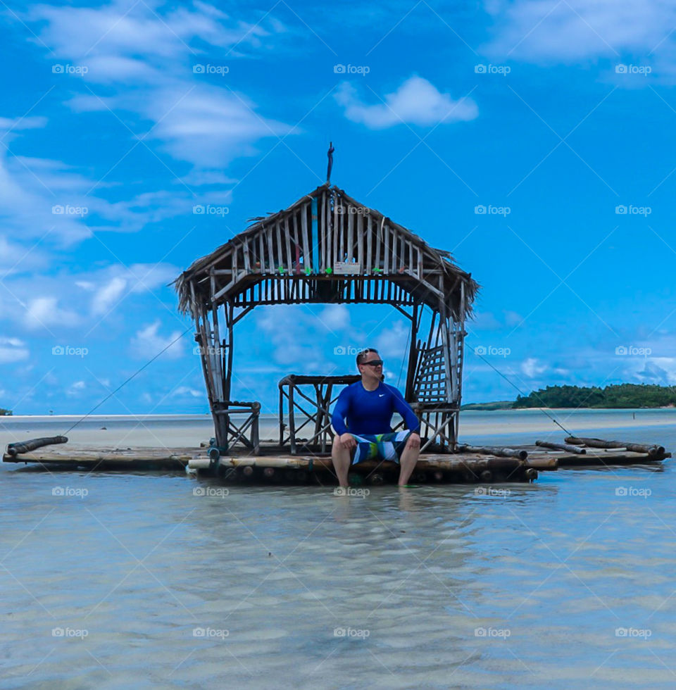This is one of my unforgettable shot during my summer vacation with my families in remote islands of Caramoan Philippines. Floating cottages on a sand bars during Low tides.