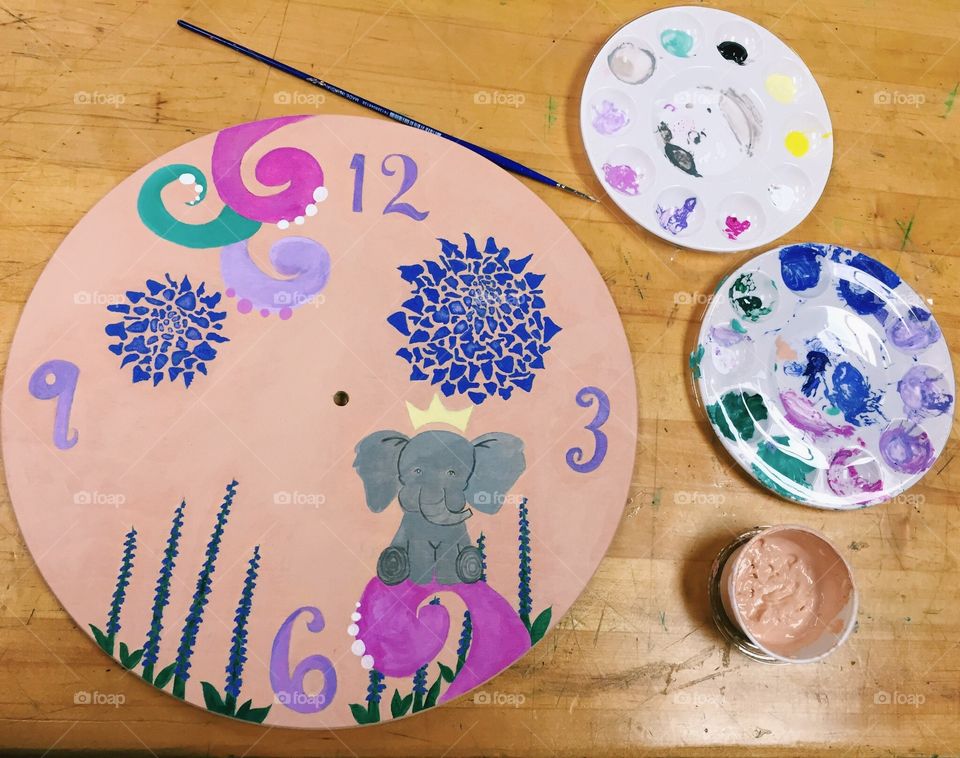 Wooden clock with abstract art and elephant 