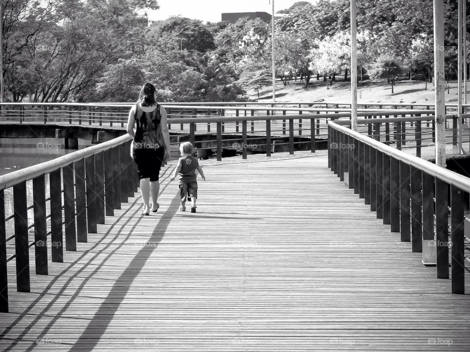 Mother and son walking