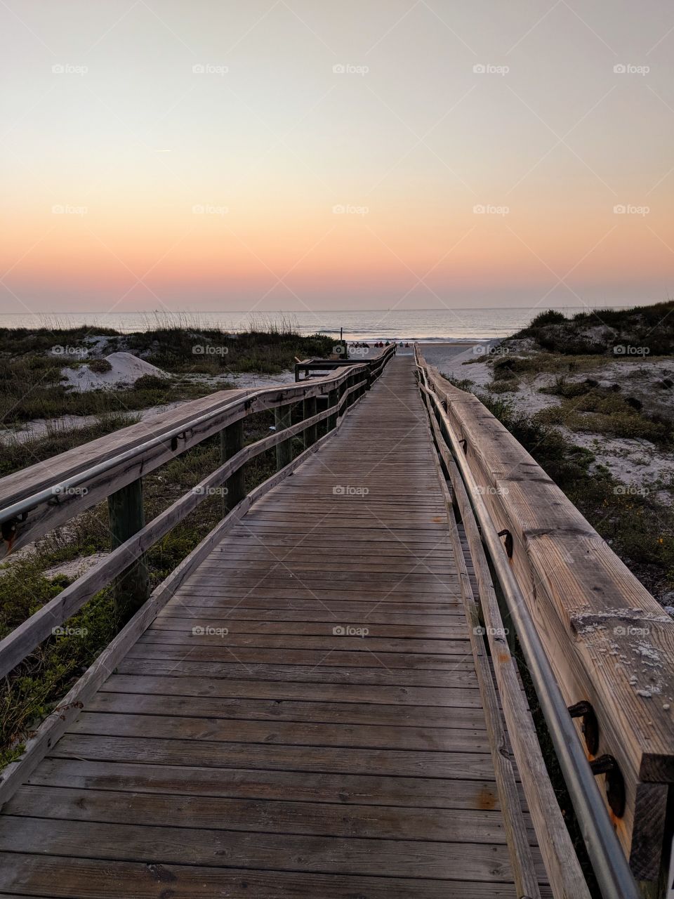Wooden walkway to the beach at Sunrise