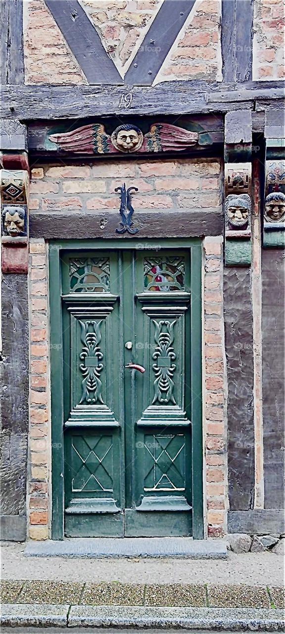 This doorway with the most interesting ornaments was found in the city of “Ystad” by the “Baltic Sea” in “Sweden”. Little men from the days of the vikings appear to be peering out at you from the most unexpected places. 2023. Hypnotic Productions