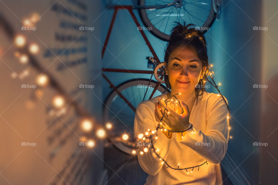 Cute girl playing with lights