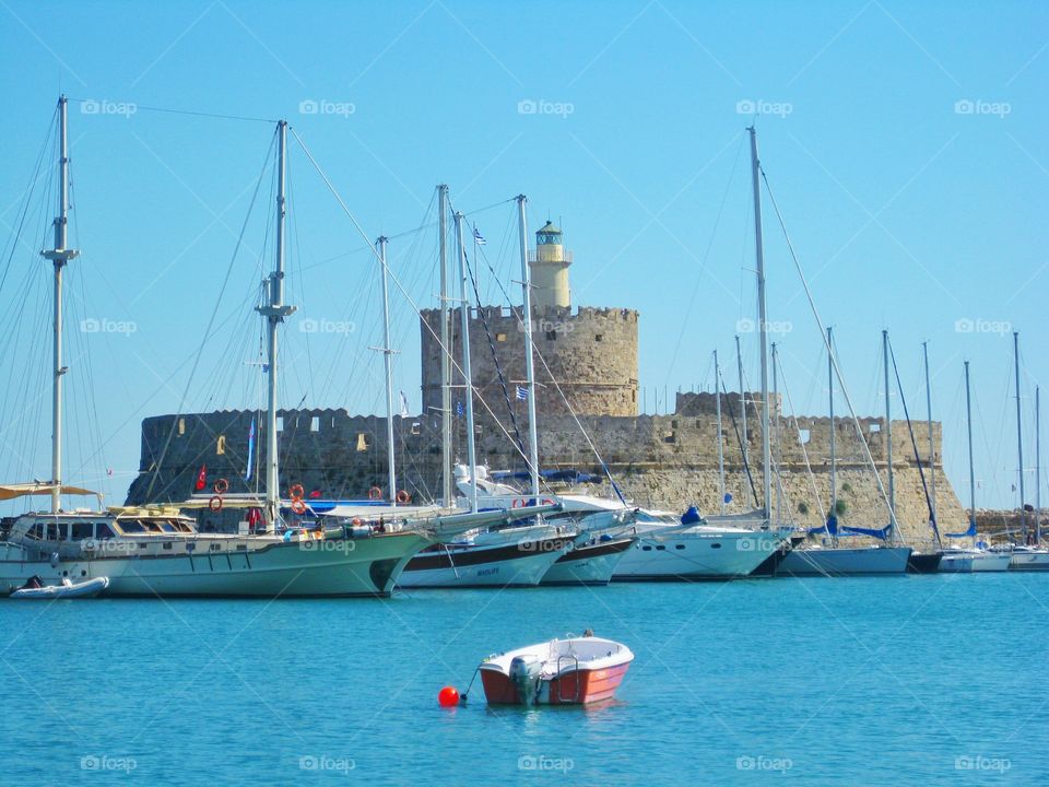 Rhodes. I took this photo in Rhodes, greek islands. It is the castle at the entrance of the island. It is one of the must see pl