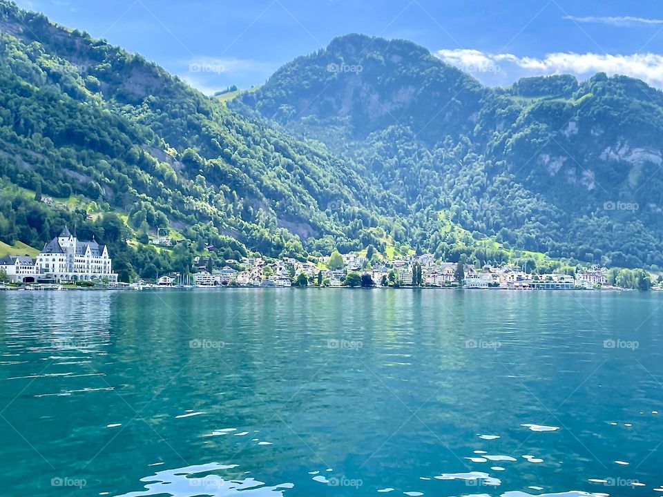 Sunny boat ride on we crystal clear Lake Lucerne, Switzerland