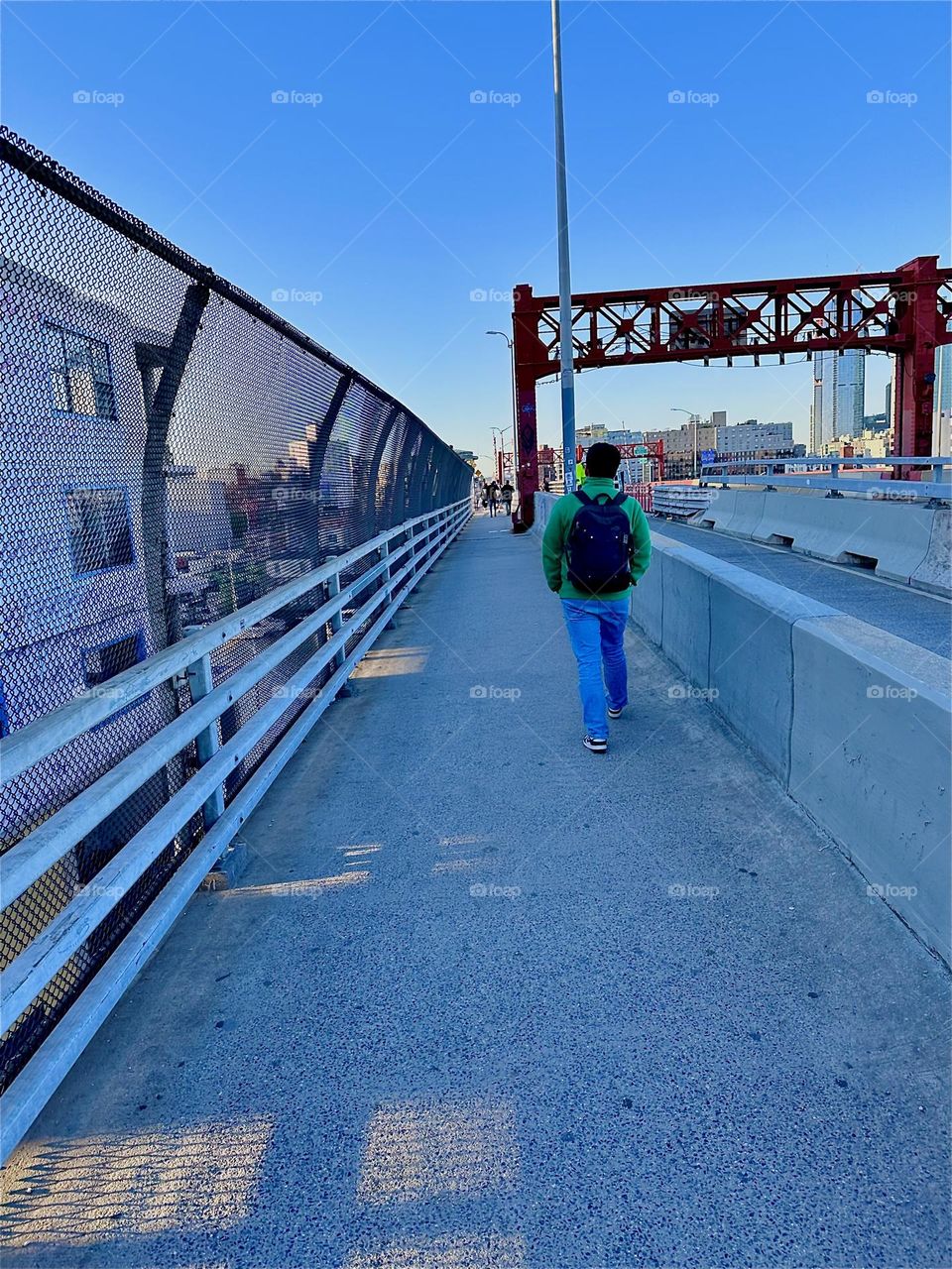 This is the pedestrian lane of the „Pulaski Bridge“ at „Newtown Creek“ that connects „Greenpoint“, Brooklyn to LIC, Queens in the direction that we are currently facing. 2024. Hypnotic Productions