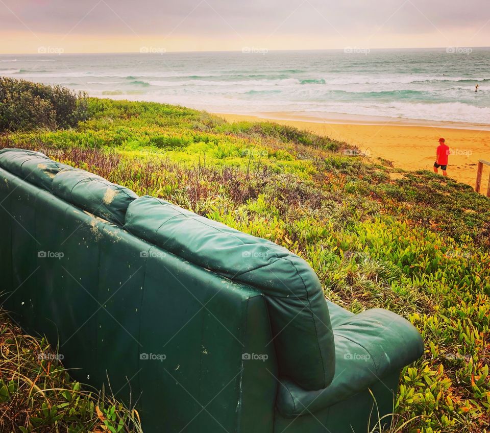 The green couch at the beach 
