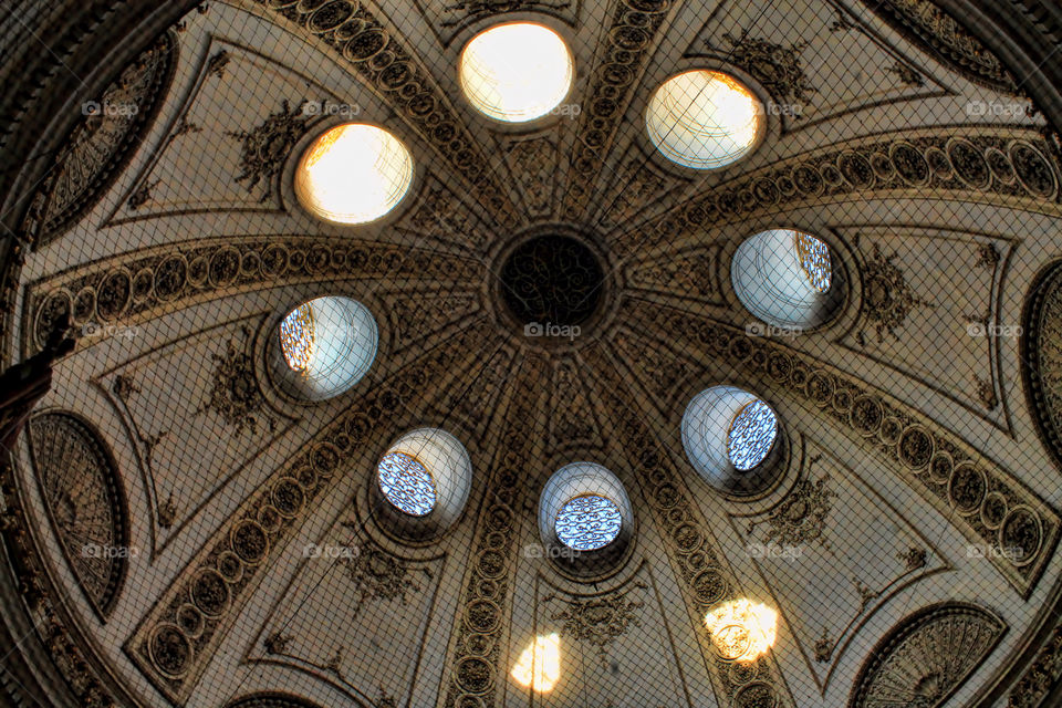 sunlight streaming through a chapel's roof