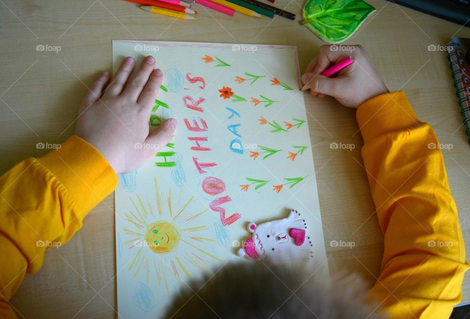 child boy drawing pencils, creative kind