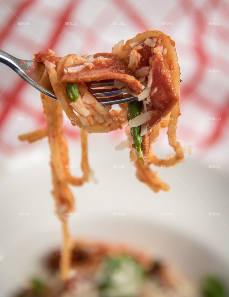 Pepperoni pasta with fork