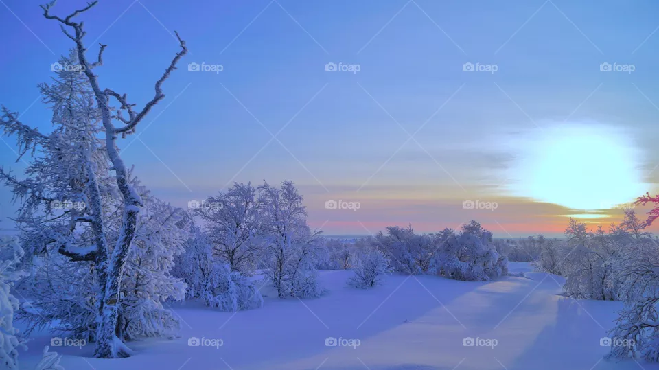 On a polar day in the north, dawn meets sunset, and you need to have time to capture this.