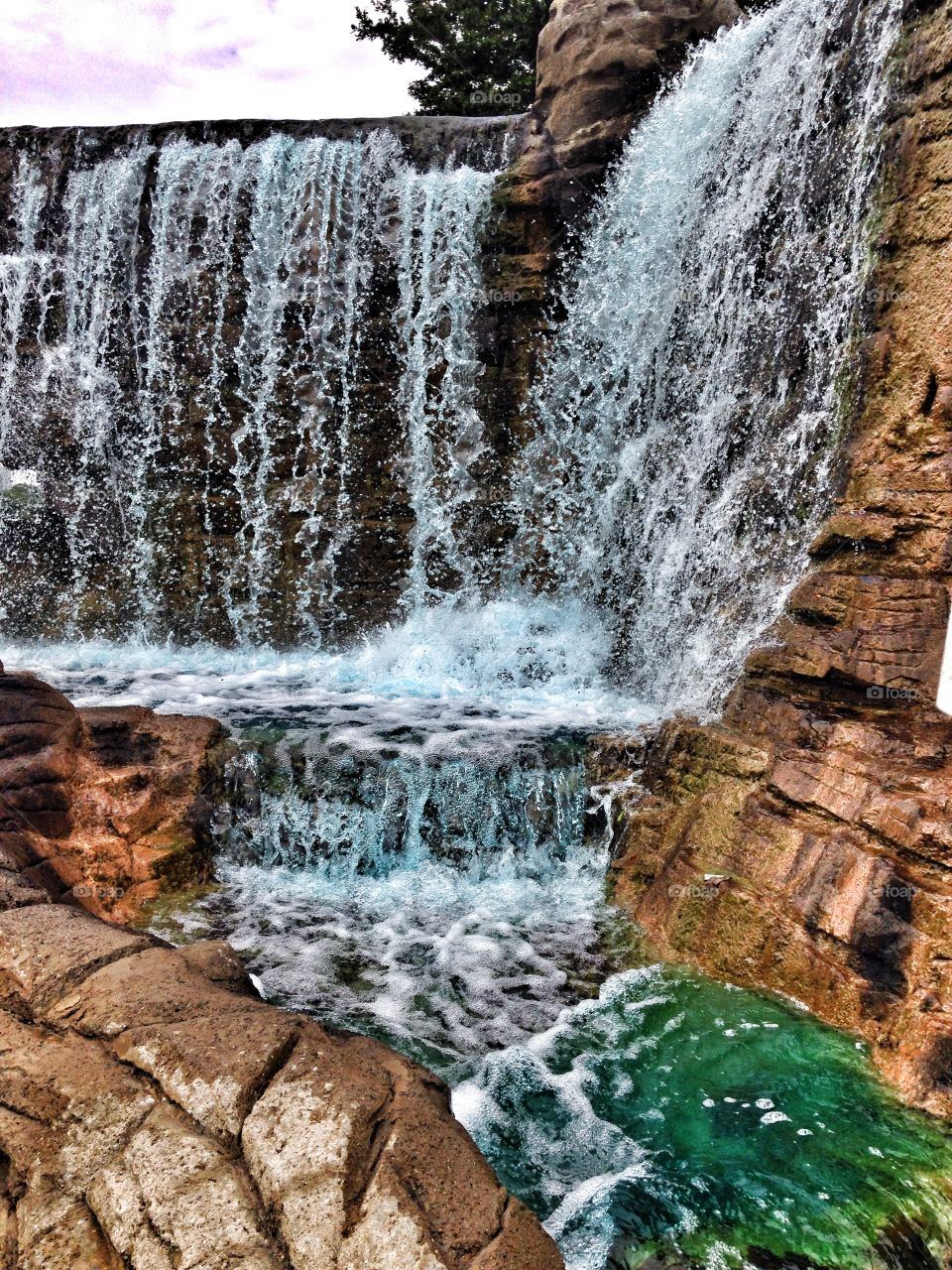 Sounds of nature. Waterfall at mini golf course