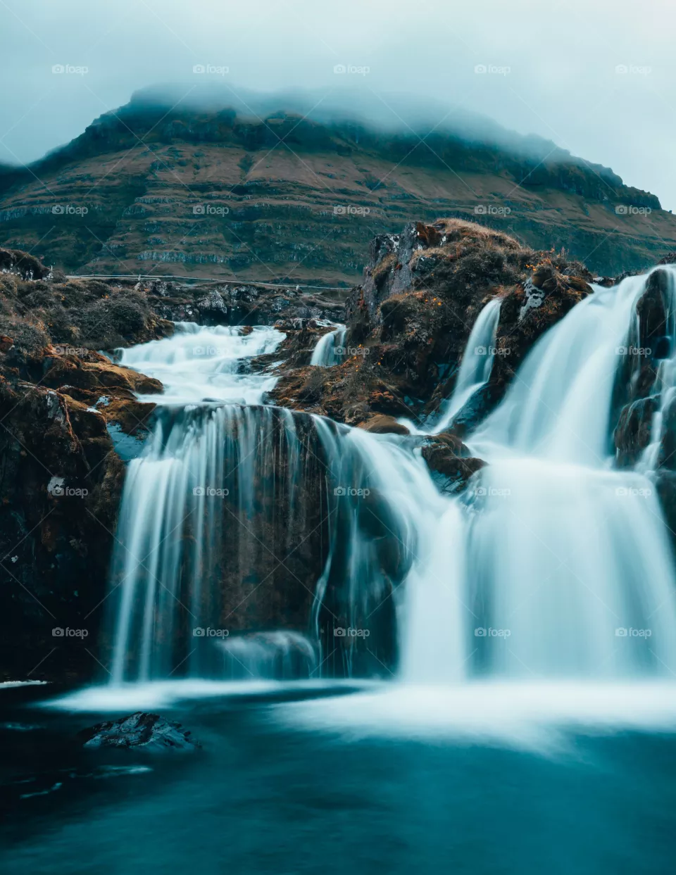 water falls from the mountain