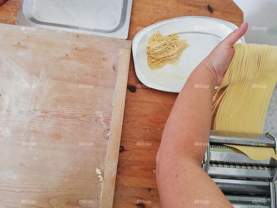 Italian housewife makes pasta at home