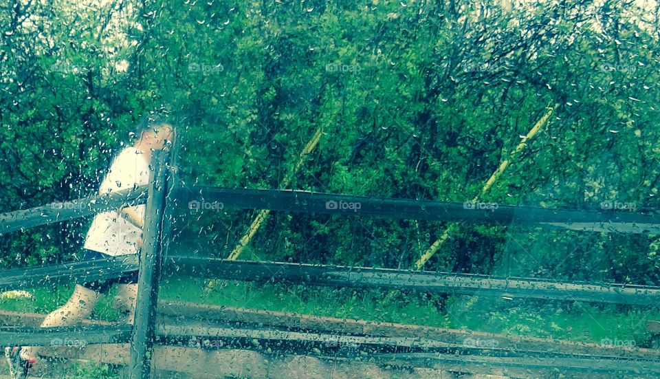 Rainy Runner. Man running through the rain. 