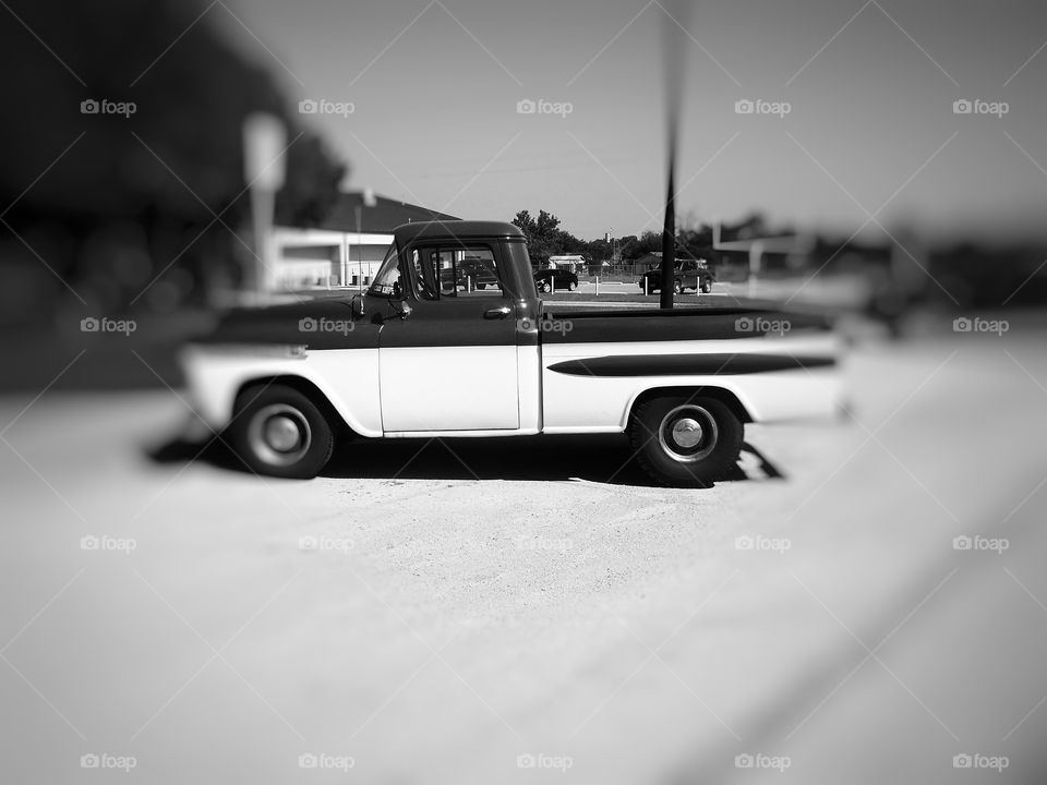 old Chevrolet. This is a picture of a old Chevrolet that was parked at the football 🏈 field