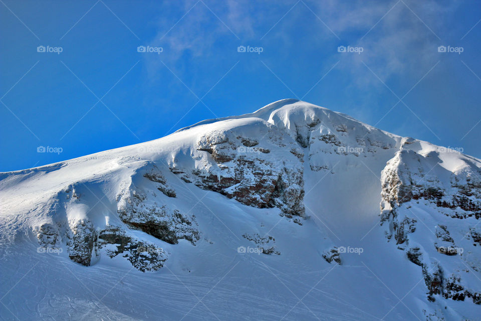 Snowcovered mountain peak