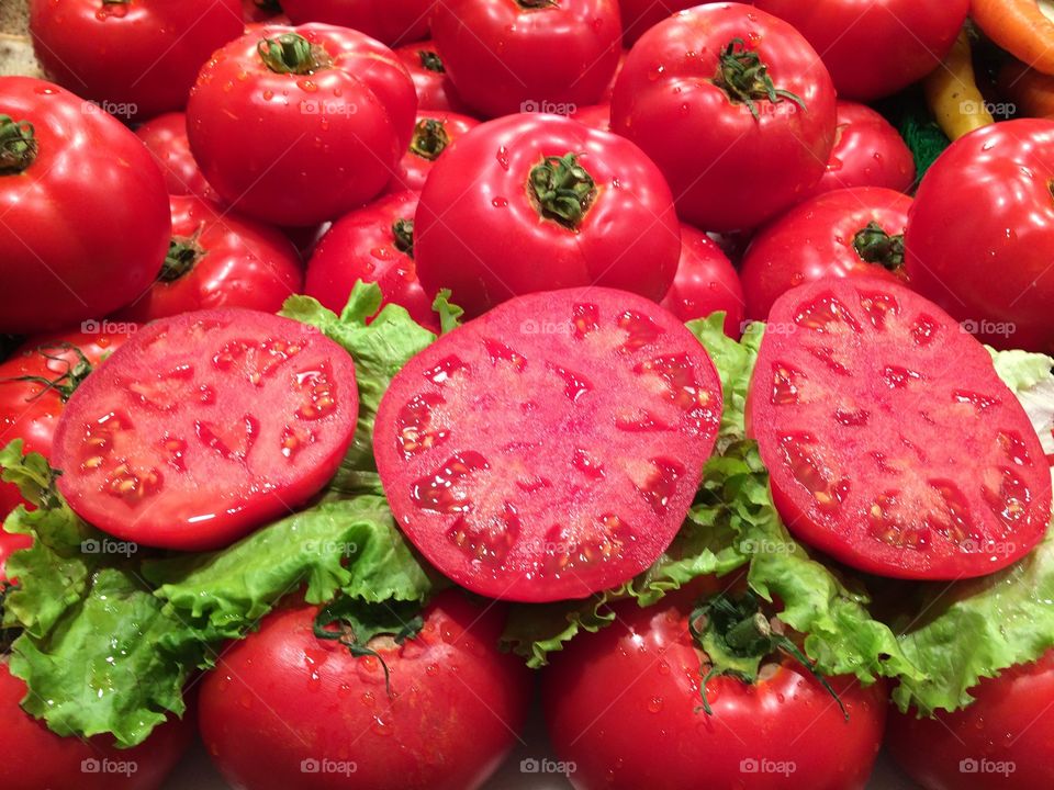 Fresh tomatoes with slice and lettuce