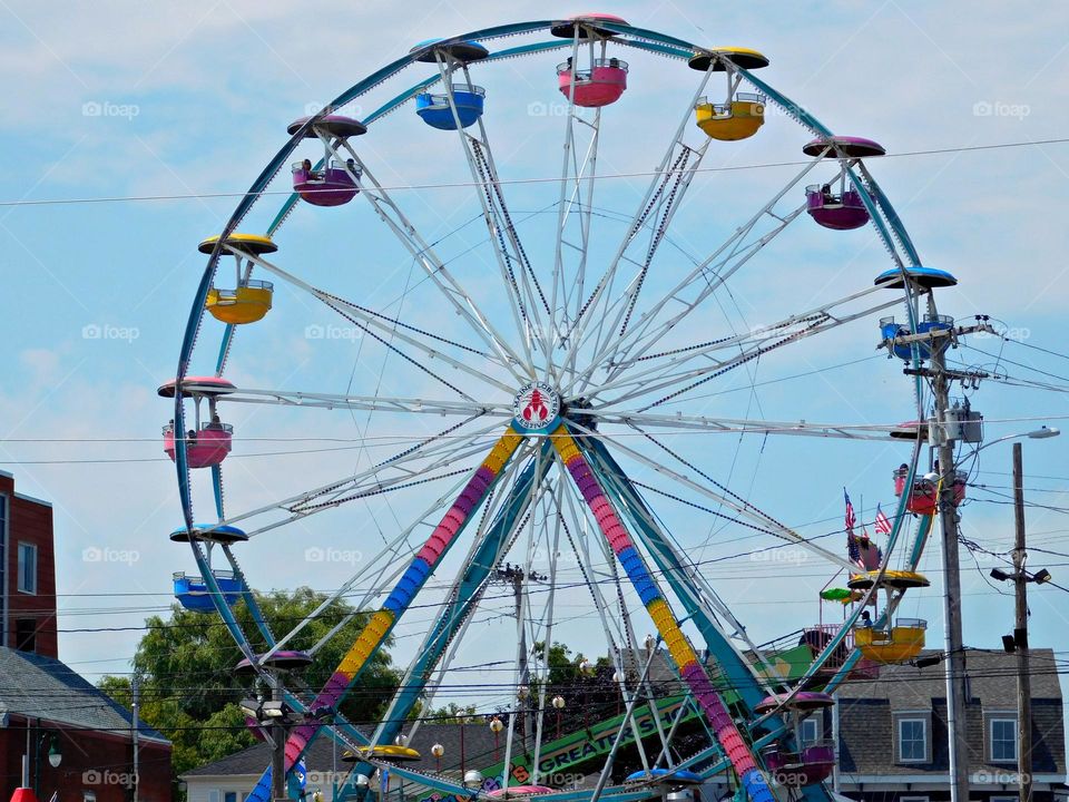 It is through action that you set the wheels of Life in Motion - A Ferris wheel goes round and round