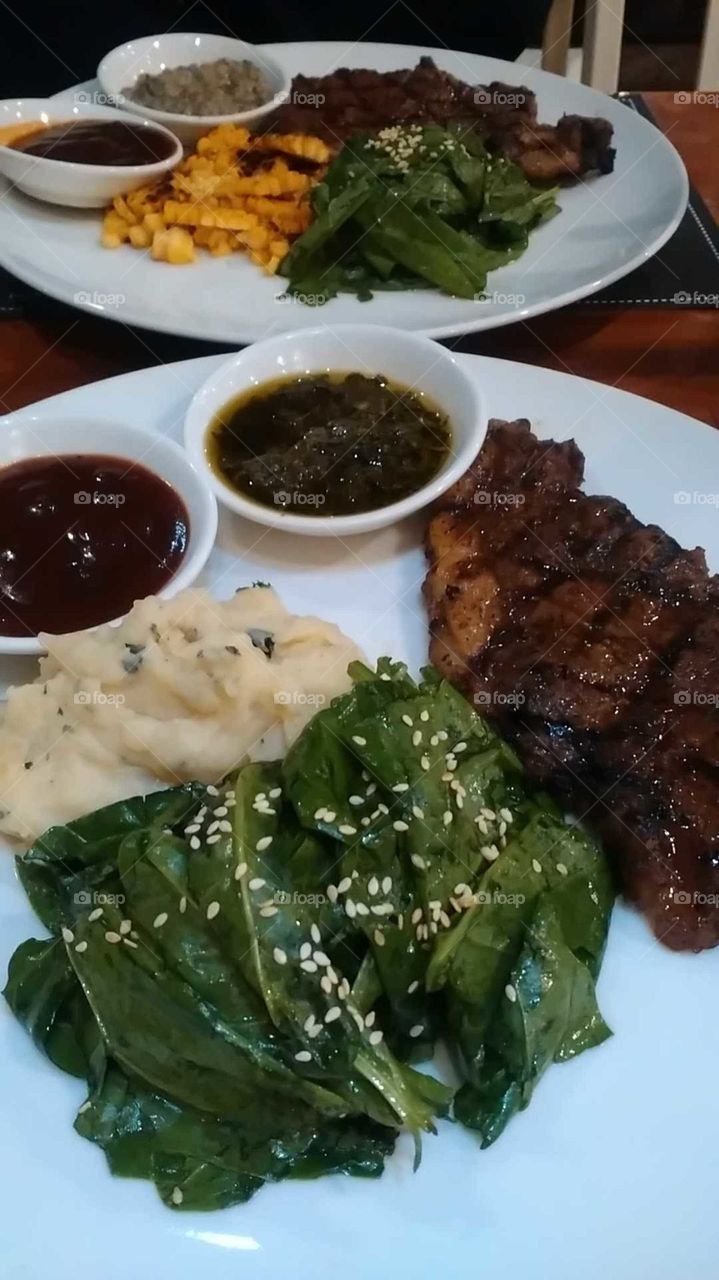 Steak with mashed potato on plate