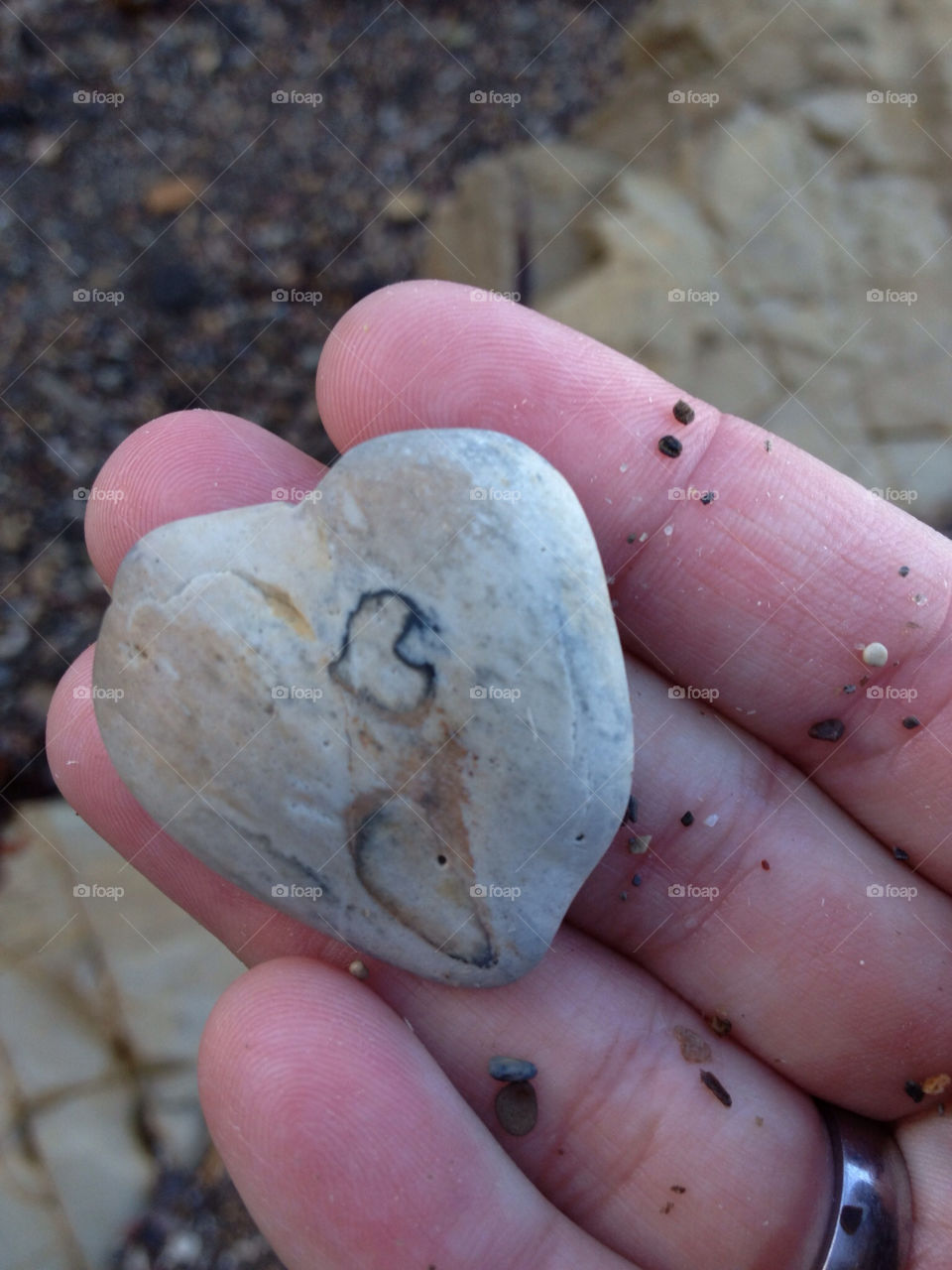 Heart shaped rock with a heart shaped stain