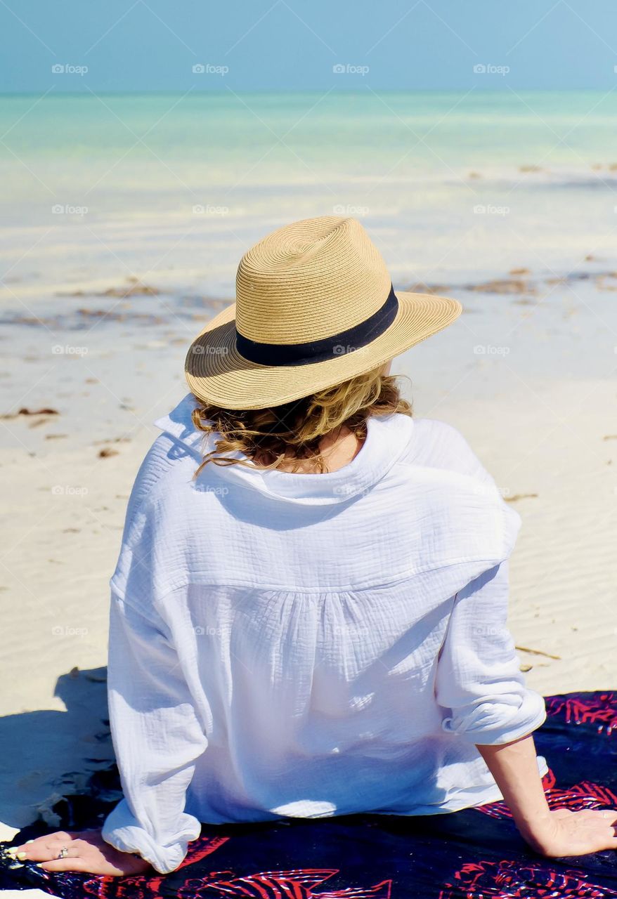 Mom taking a break on the beach.