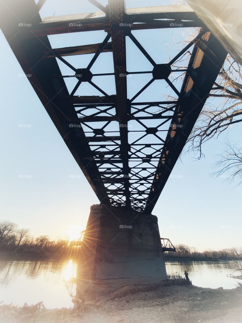 Train bridge at sunset