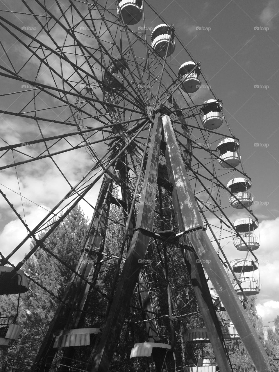 Abandoned Ferris Wheel. Ferris Wheel in the abandoned city of Pripyat, Ukraine. This city is located within a few miles Chernobyl.