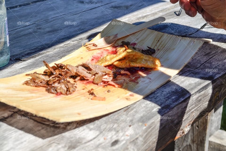 Food on a wooden plate