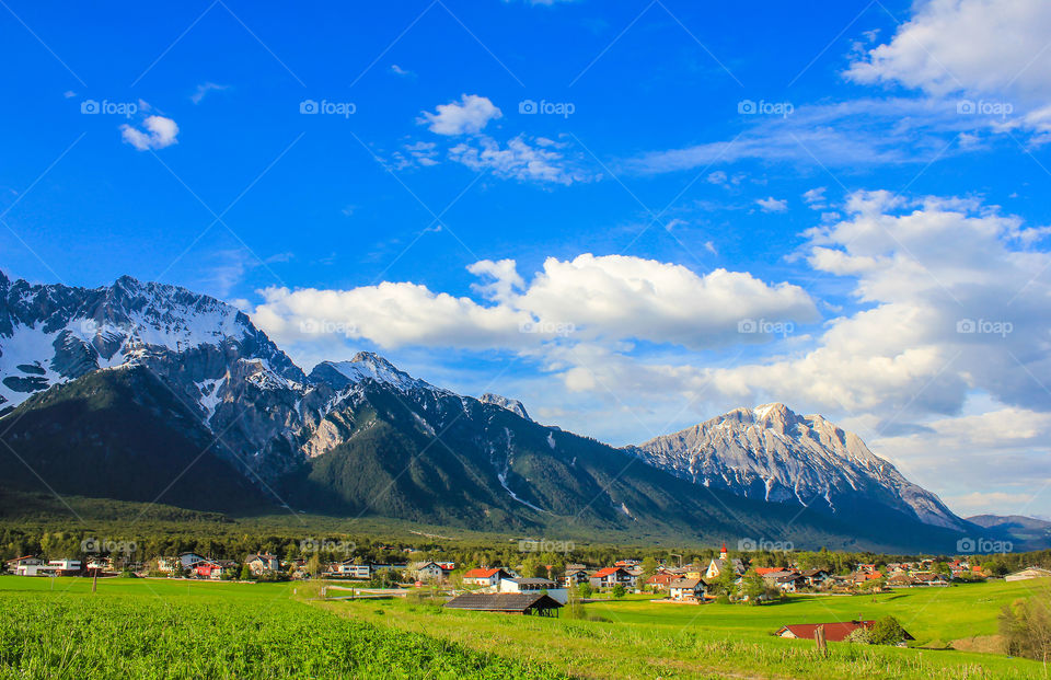 View of a town in grassy landscape