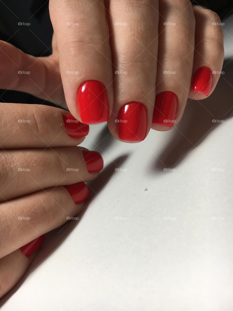 Painted nails, gel polish on nails, women's beautiful and neat manicure