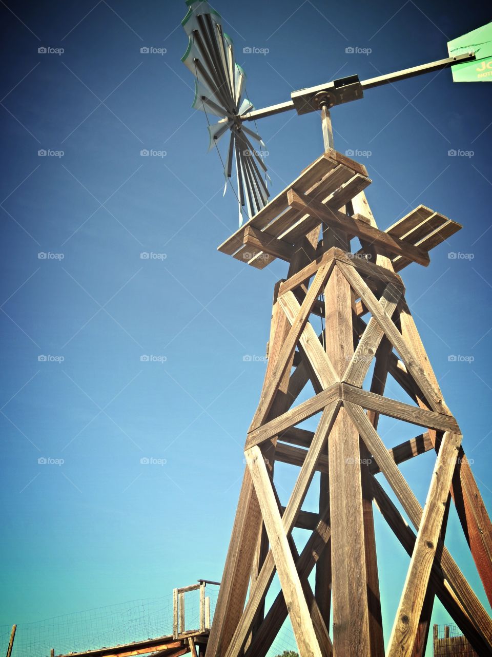 Vintage wind mill on a farm.