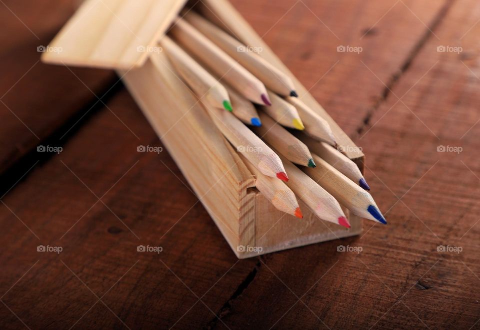 wooden pencil on a wood board