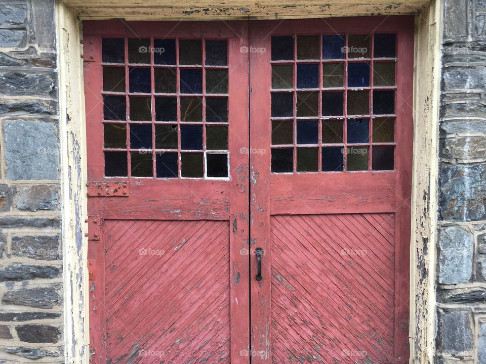 Close-up of old red doors