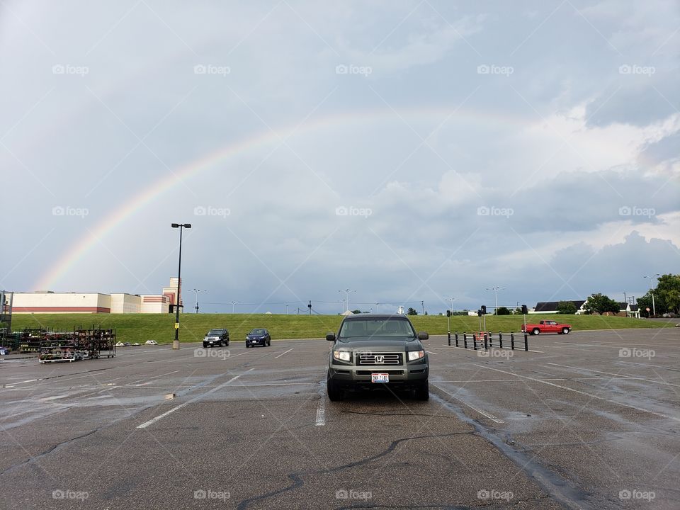 Parking Lot Rainbow - A stunning, unfiltered rainbow.