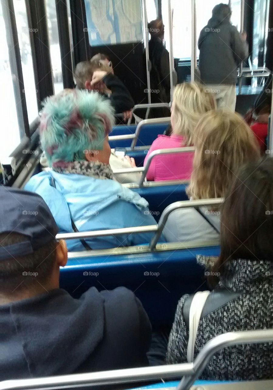 blue and purple hair not a wig NYC. on bus