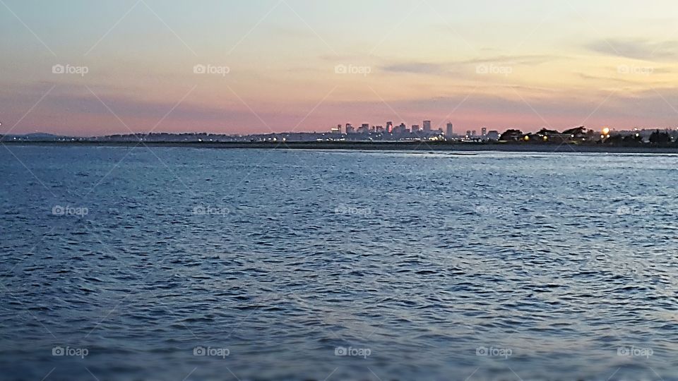 ocean with Boston in the background