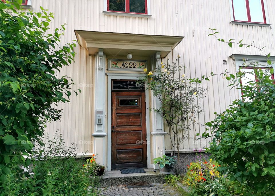 House with beautiful door and garden