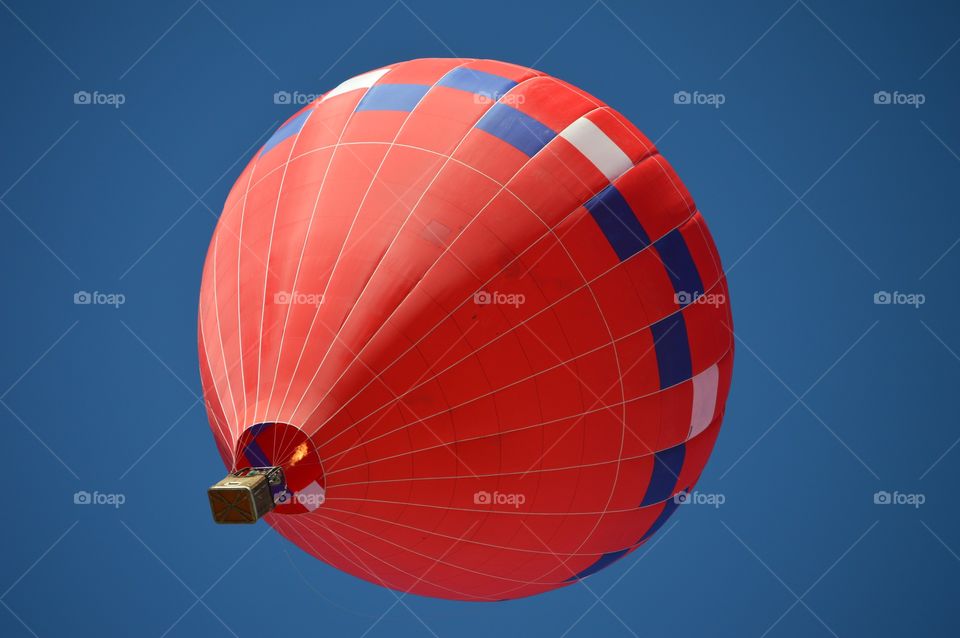 Red hot air balloon during New Mexico Balloon Fiesta.