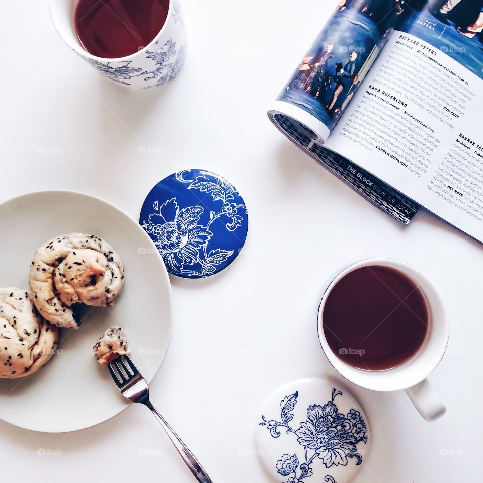 Tea time . Tea time with sesame breads 
Take a break with magazine 