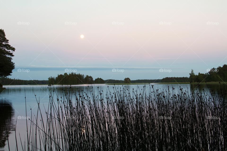 full moon over the water