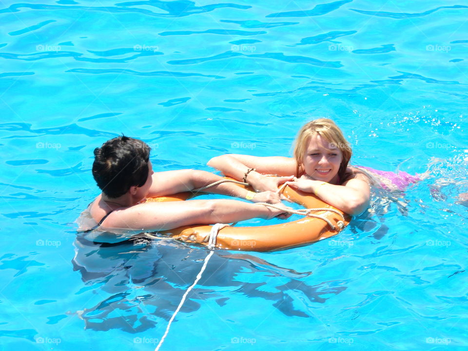 Two women in swimming pool