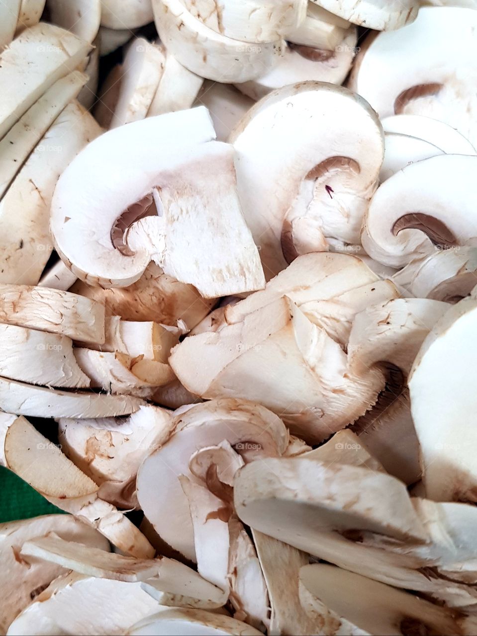 Sliced mushrooms at work.