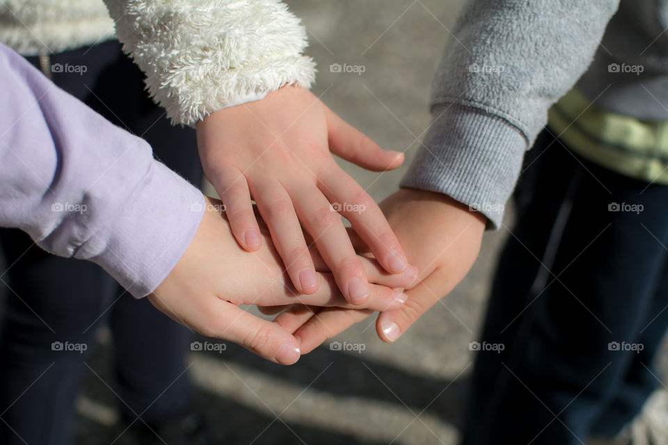 kids shaking hands