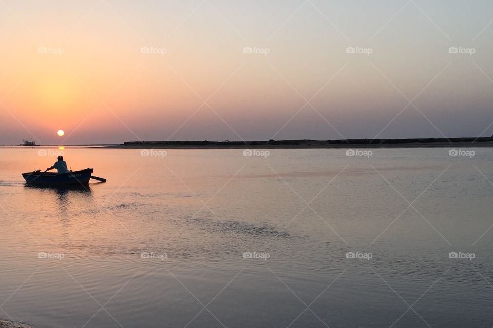 Sunrise and fishermen