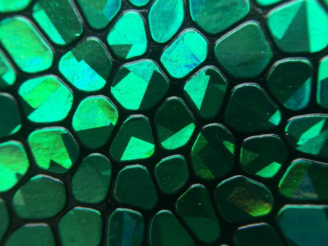 Texture with pattern of green little stones 