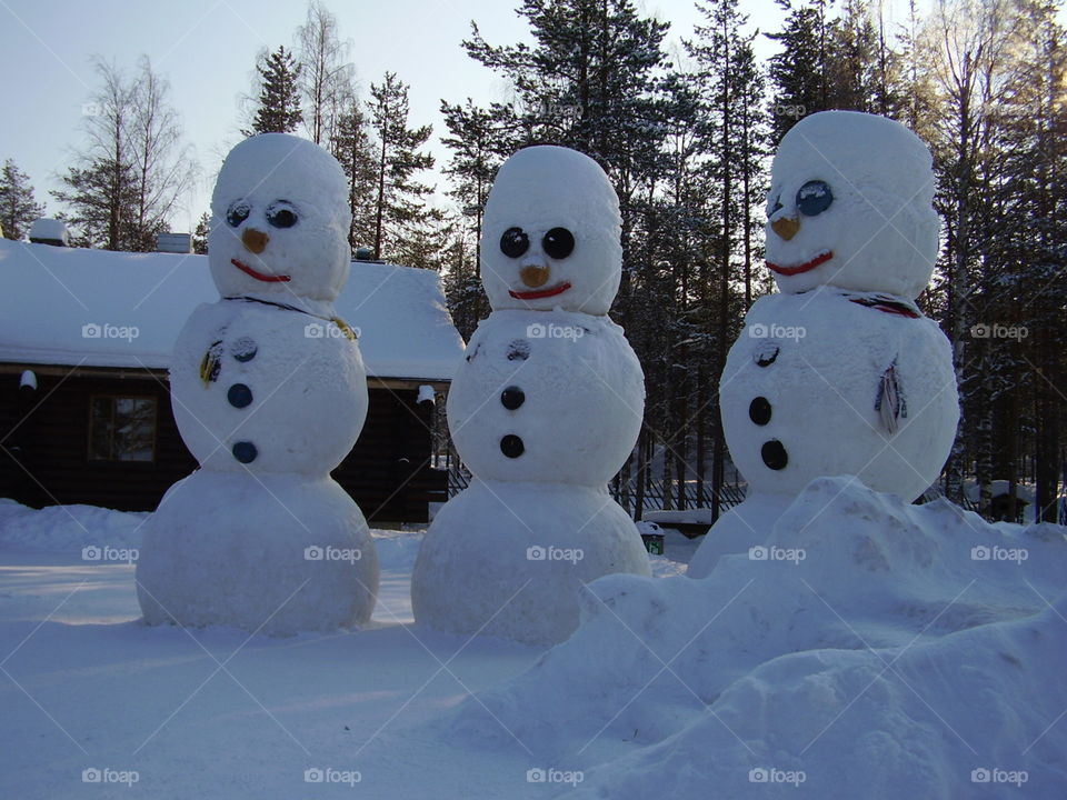 Snowmen in Lapland